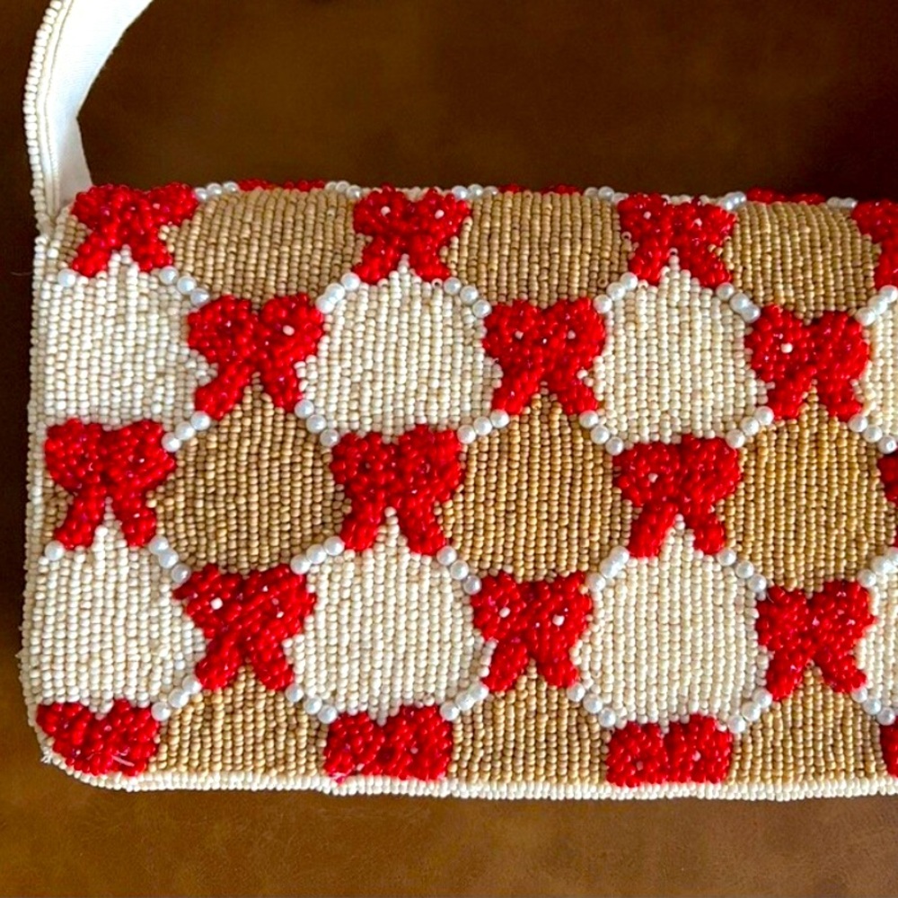 Anthropologie Fiona beaded bow bag. New without tag. Adorable bag!